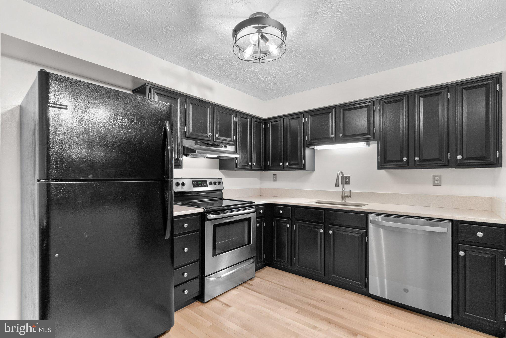 17159 Moss Side Lane, Unit 3 Olney, MD 20832 - Photo 11 of 39 Kitchen w/ updated counters