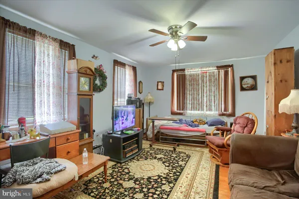 a bedroom with furniture or couch and a window