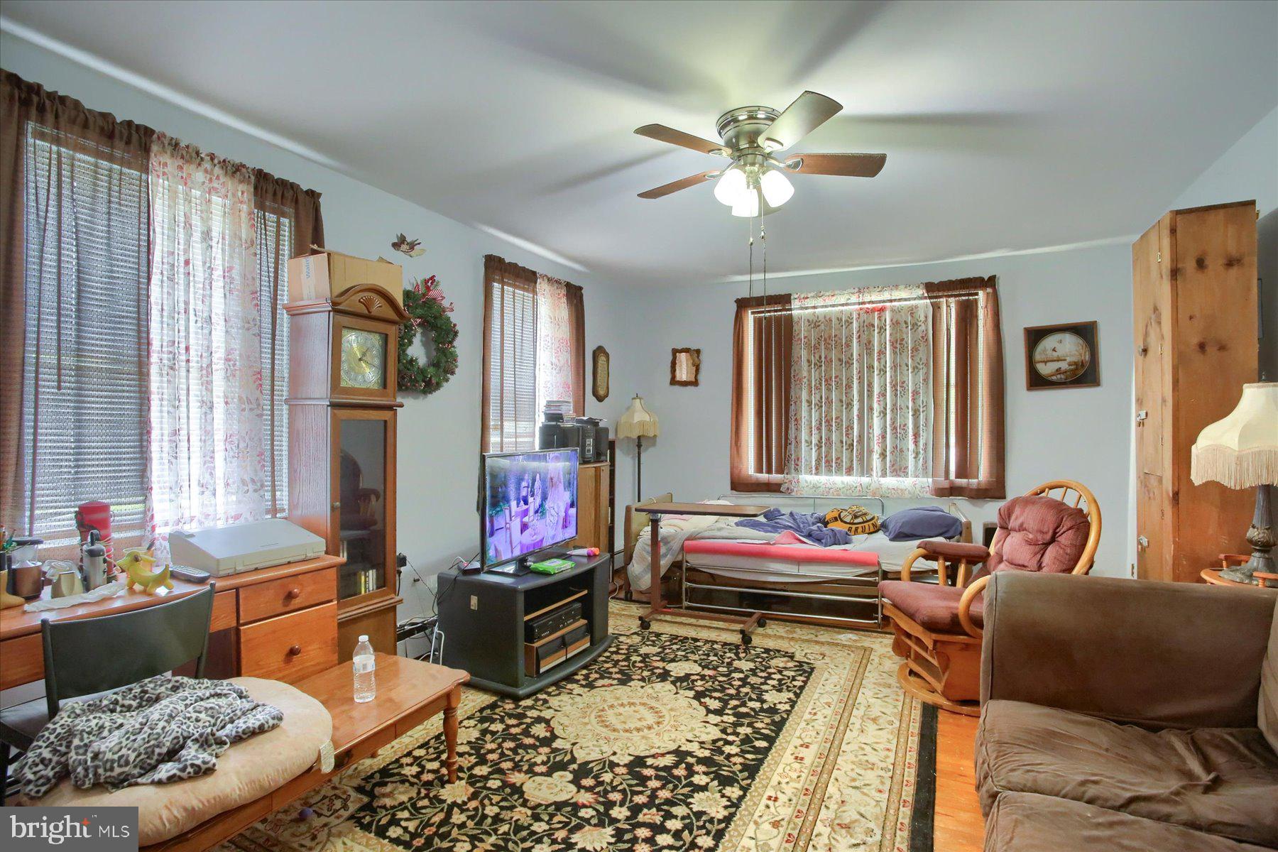 46 Front Street New Buffalo, PA 17069 - Photo 5 of 28 a bedroom with furniture or couch and a window