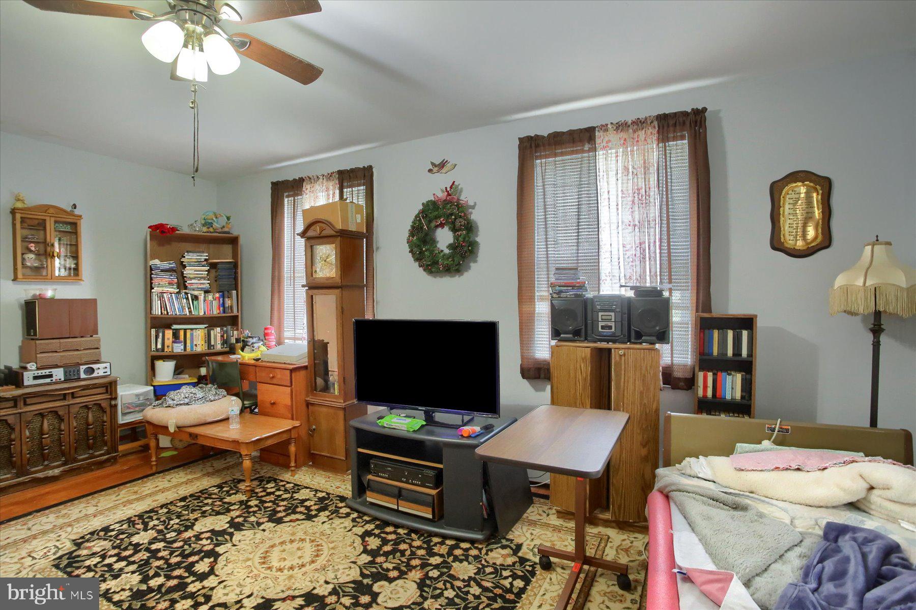 46 Front Street New Buffalo, PA 17069 - Photo 6 of 28 a living room with furniture and a fireplace