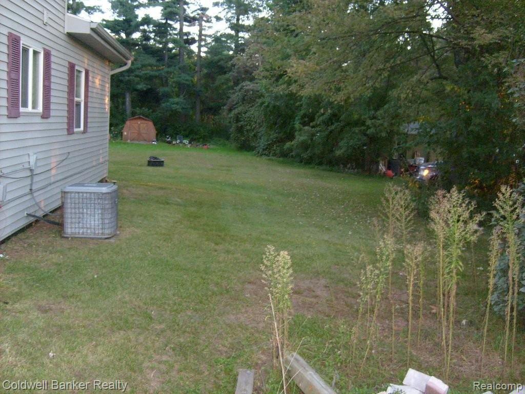 24980 23 Mile Road Macomb, MI 48042 - Photo 32 of 37 side yard