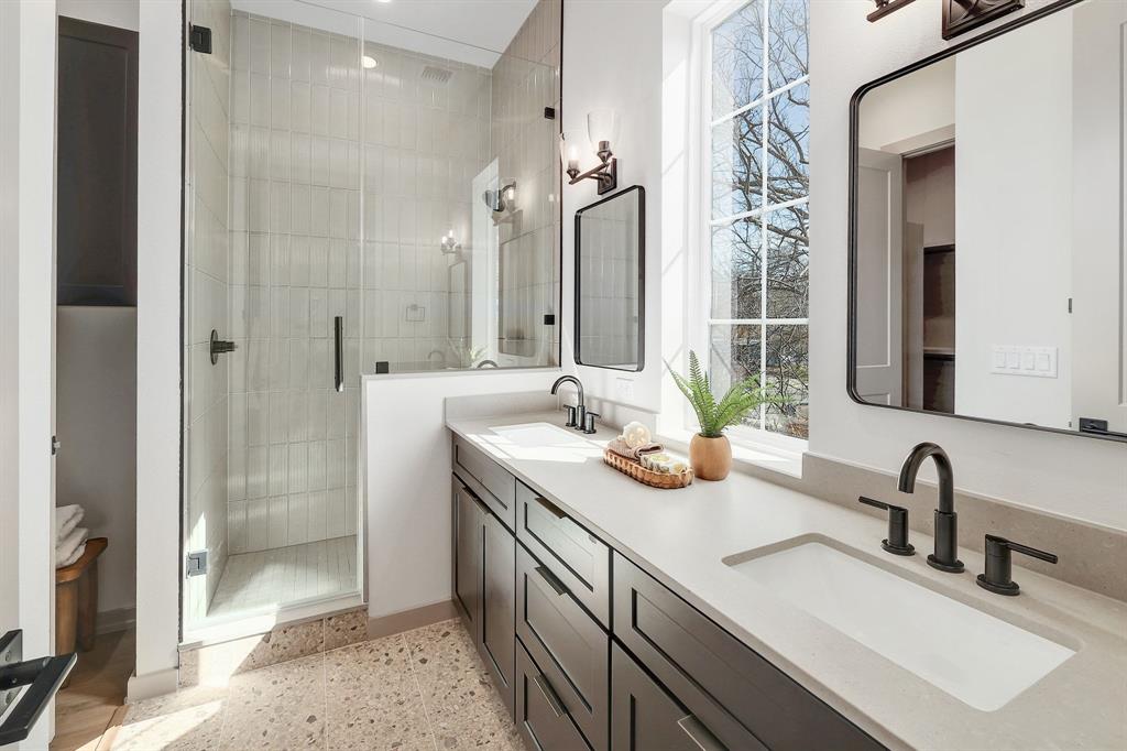 1732 Bunche Road, Unit B2 Austin, TX 78721 - Photo 5 of 22 a bathroom with double sink and a mirror