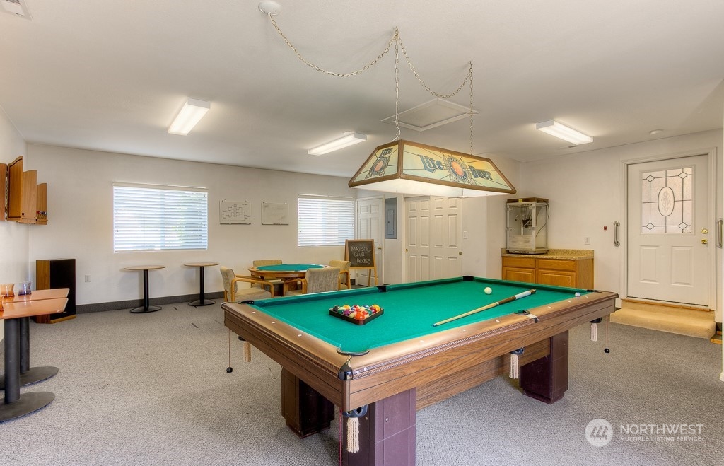 832 Maple Lane Southwest, Unit 59 Orting, WA 98360 - Photo 27 of 32 a room with pool table and windows
