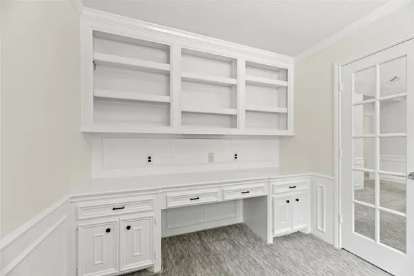 a view of cabinets and window
