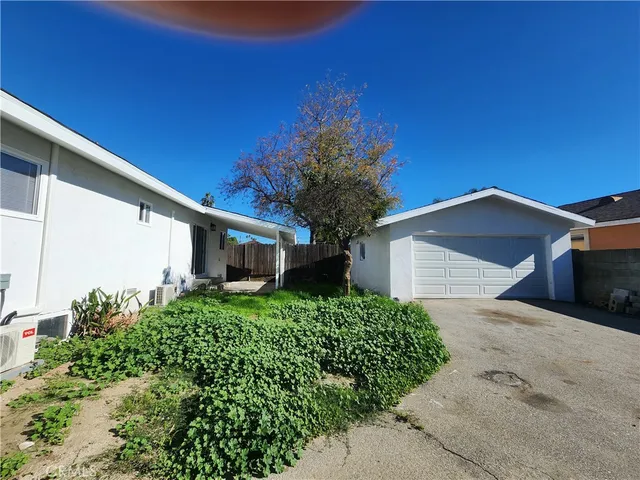 a house view with a outdoor space