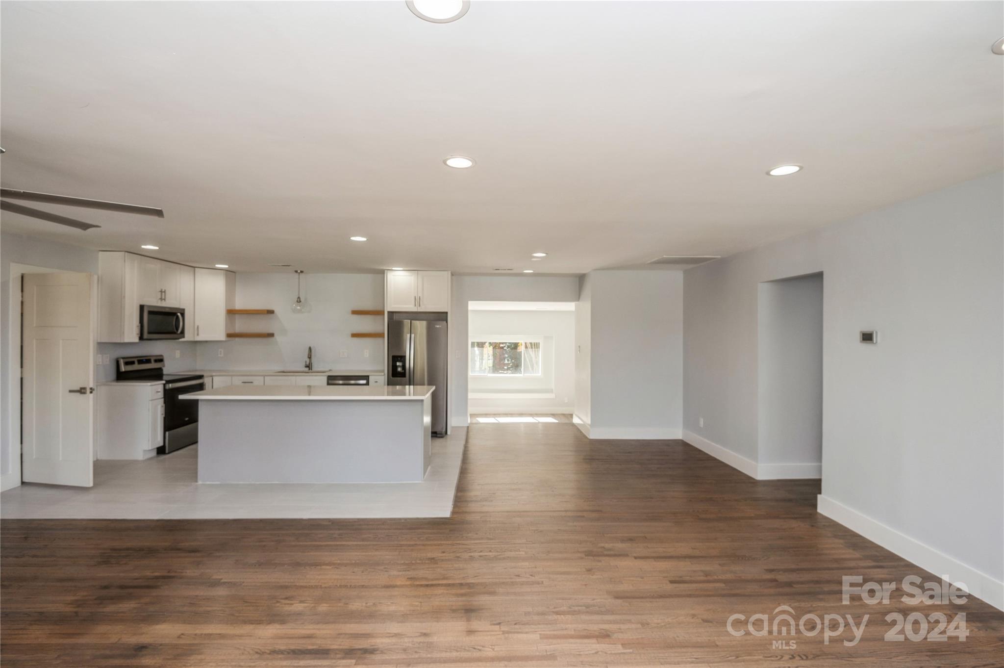 2124 Tyvola Road Charlotte, NC 28210 - Photo 11 of 38 a view of kitchen with wooden floor