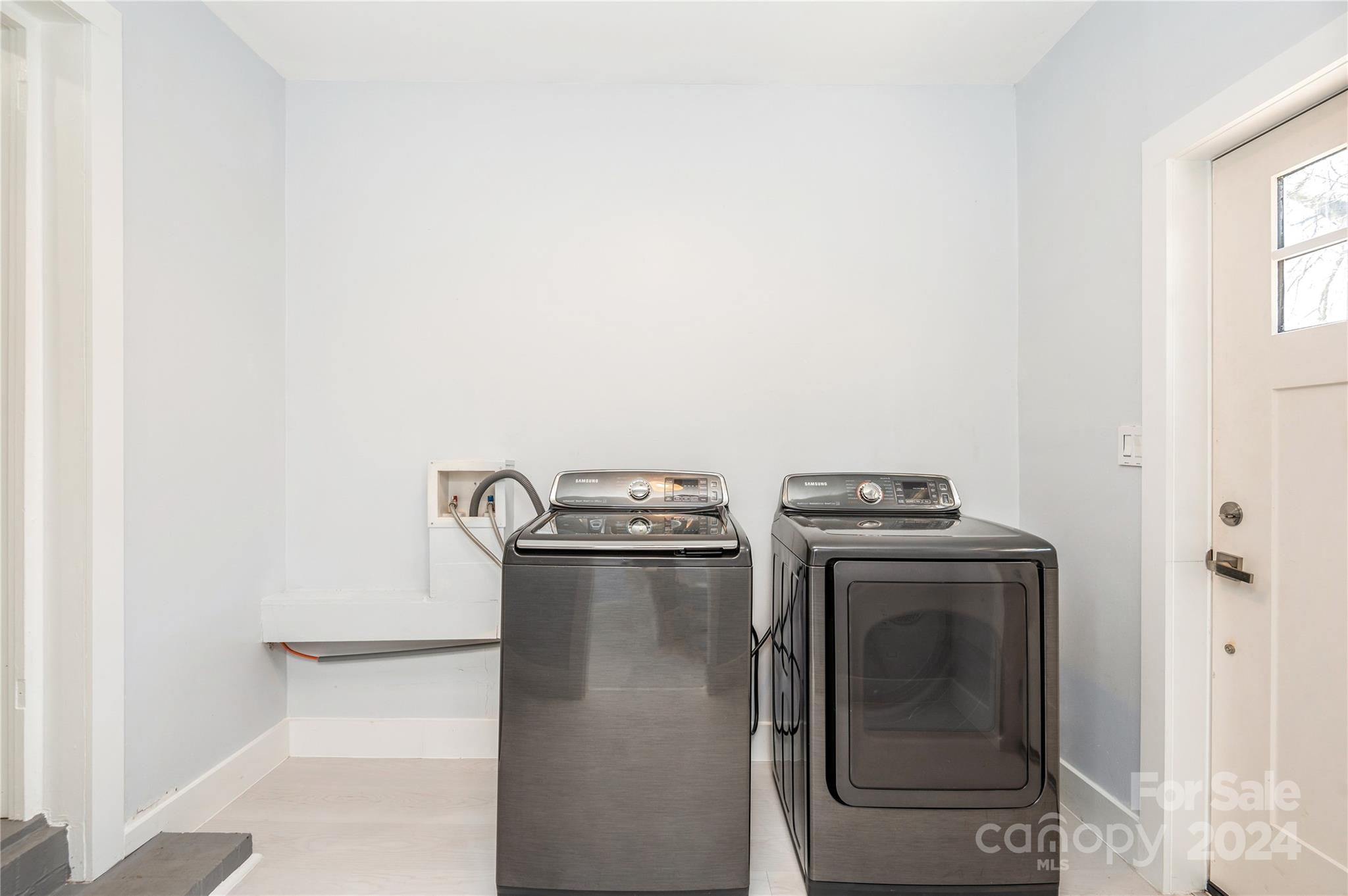 2124 Tyvola Road Charlotte, NC 28210 - Photo 20 of 38 a utility room with dryer and washer