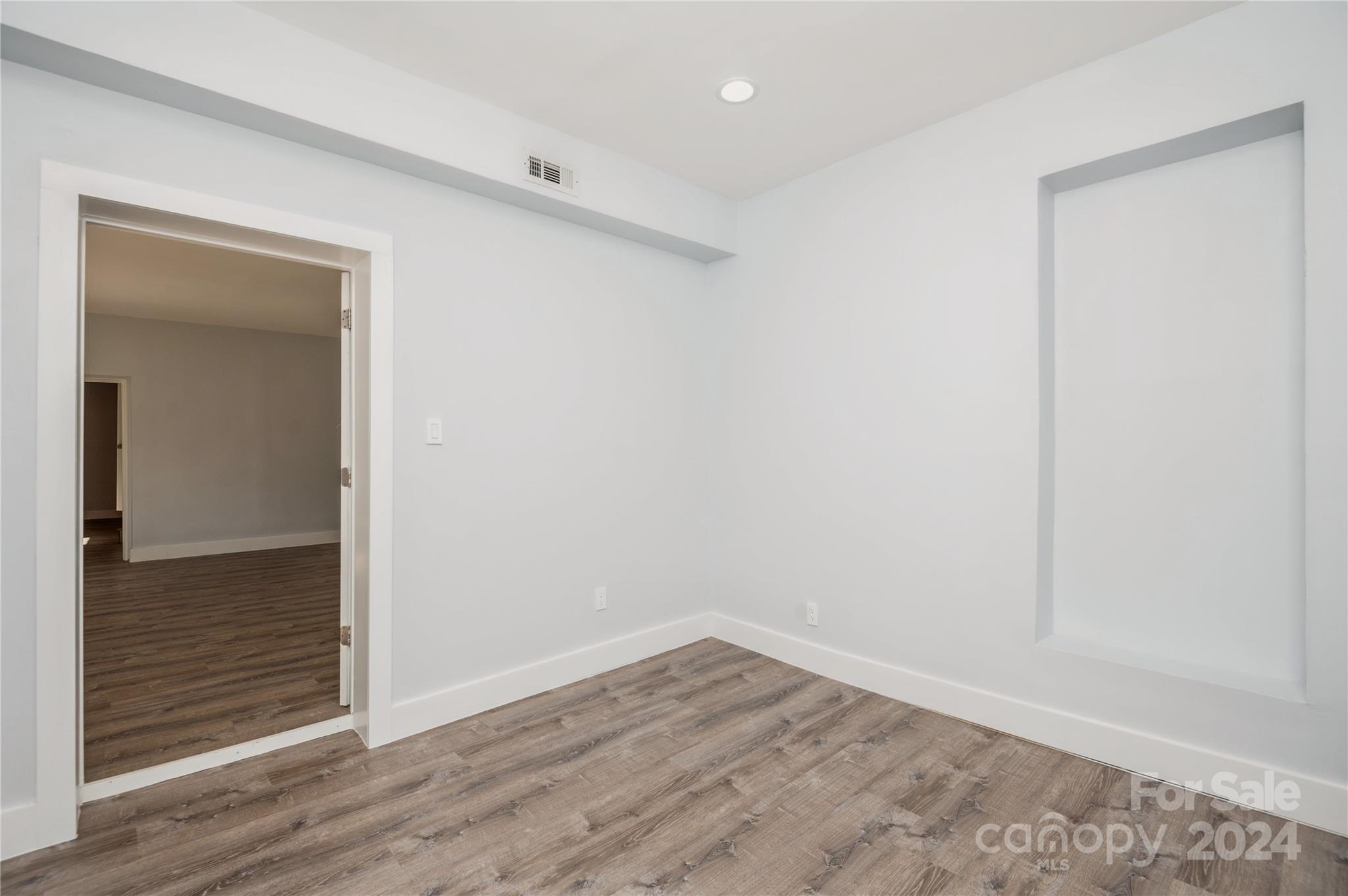 2124 Tyvola Road Charlotte, NC 28210 - Photo 24 of 38 wooden floor in an empty room