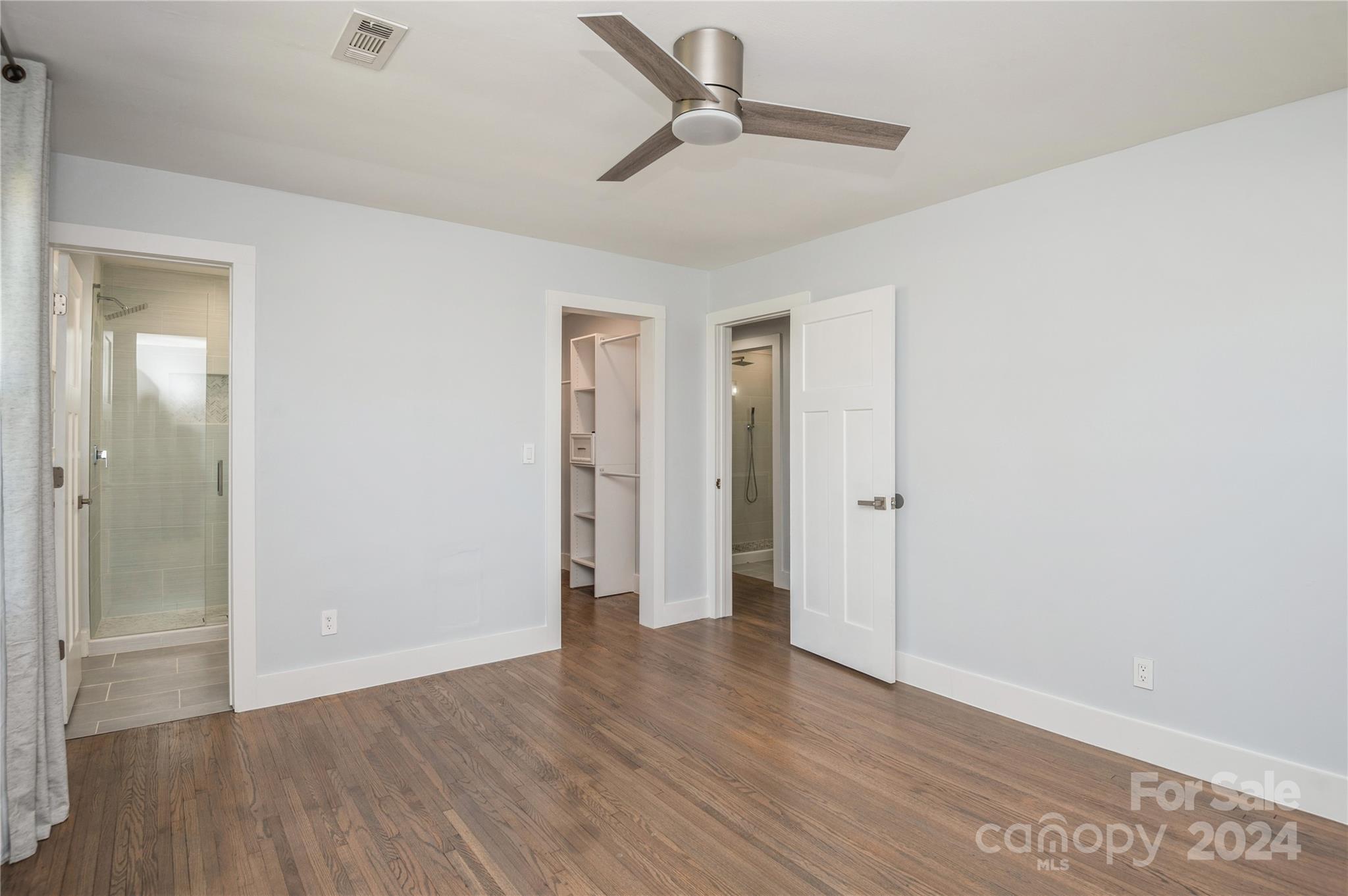2124 Tyvola Road Charlotte, NC 28210 - Photo 30 of 38 a view of an empty room with wooden floor