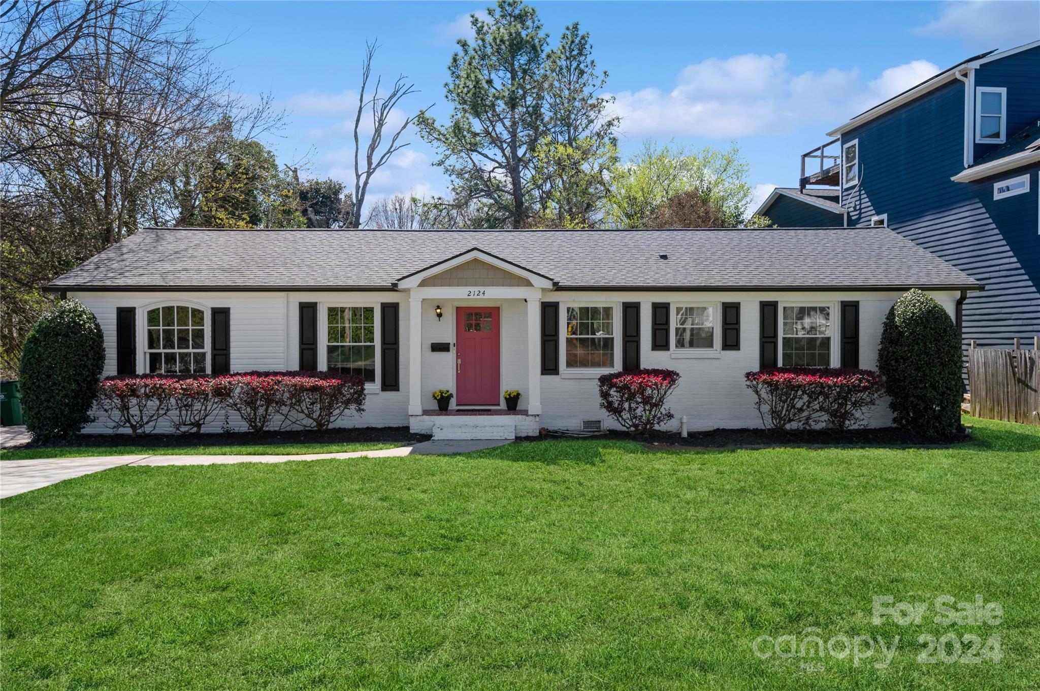 2124 Tyvola Road Charlotte, NC 28210 - Photo 36 of 38 a front view of a house with a garden