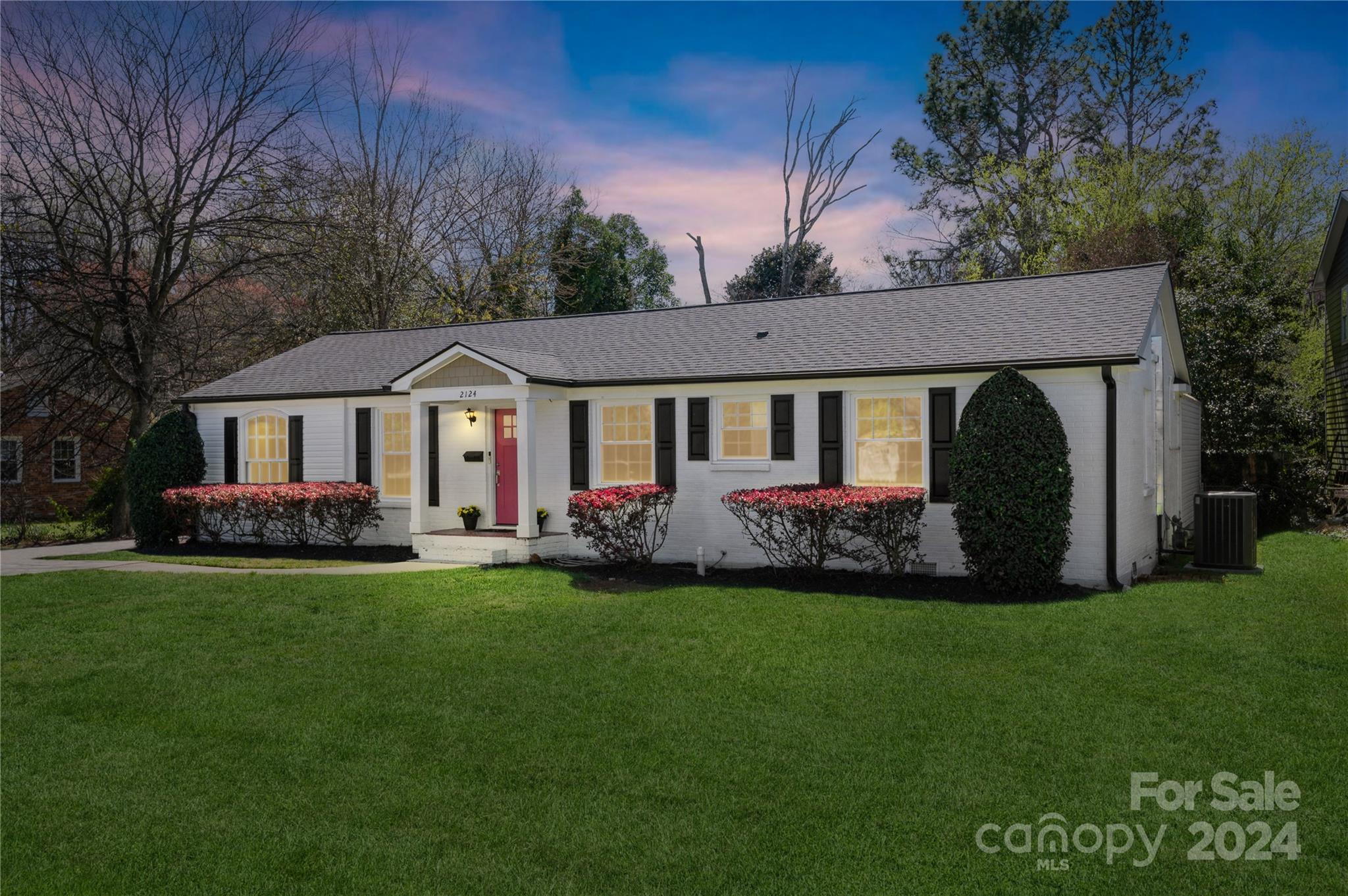 2124 Tyvola Road Charlotte, NC 28210 - Photo 38 of 38 a front view of a house with a garden