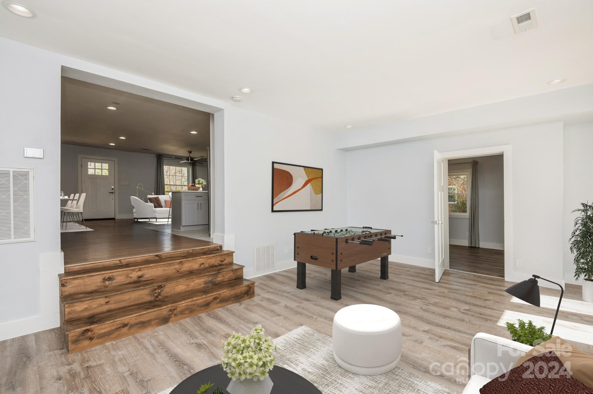 2124 Tyvola Road Charlotte, NC 28210 - Photo 6 of 38 a living room with furniture and a table