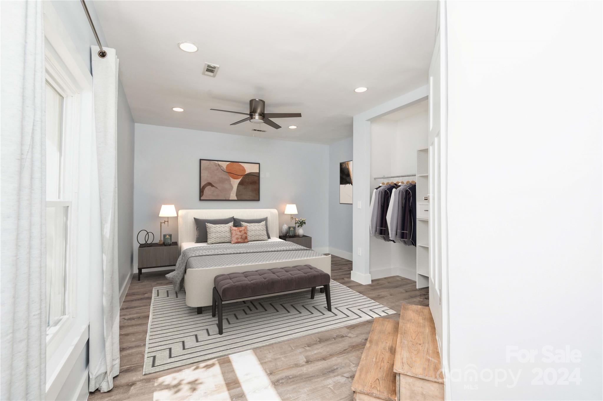 2124 Tyvola Road Charlotte, NC 28210 - Photo 10 of 38 a bedroom with a bed and a large mirror