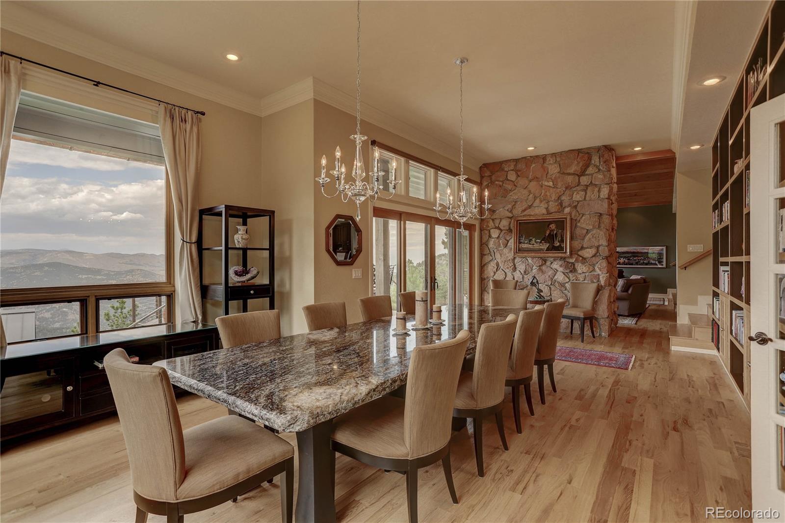 5886 Flagstaff Road Boulder, CO 80302 - Photo 15 of 37 a view of a livingroom with furniture window and wooden floor