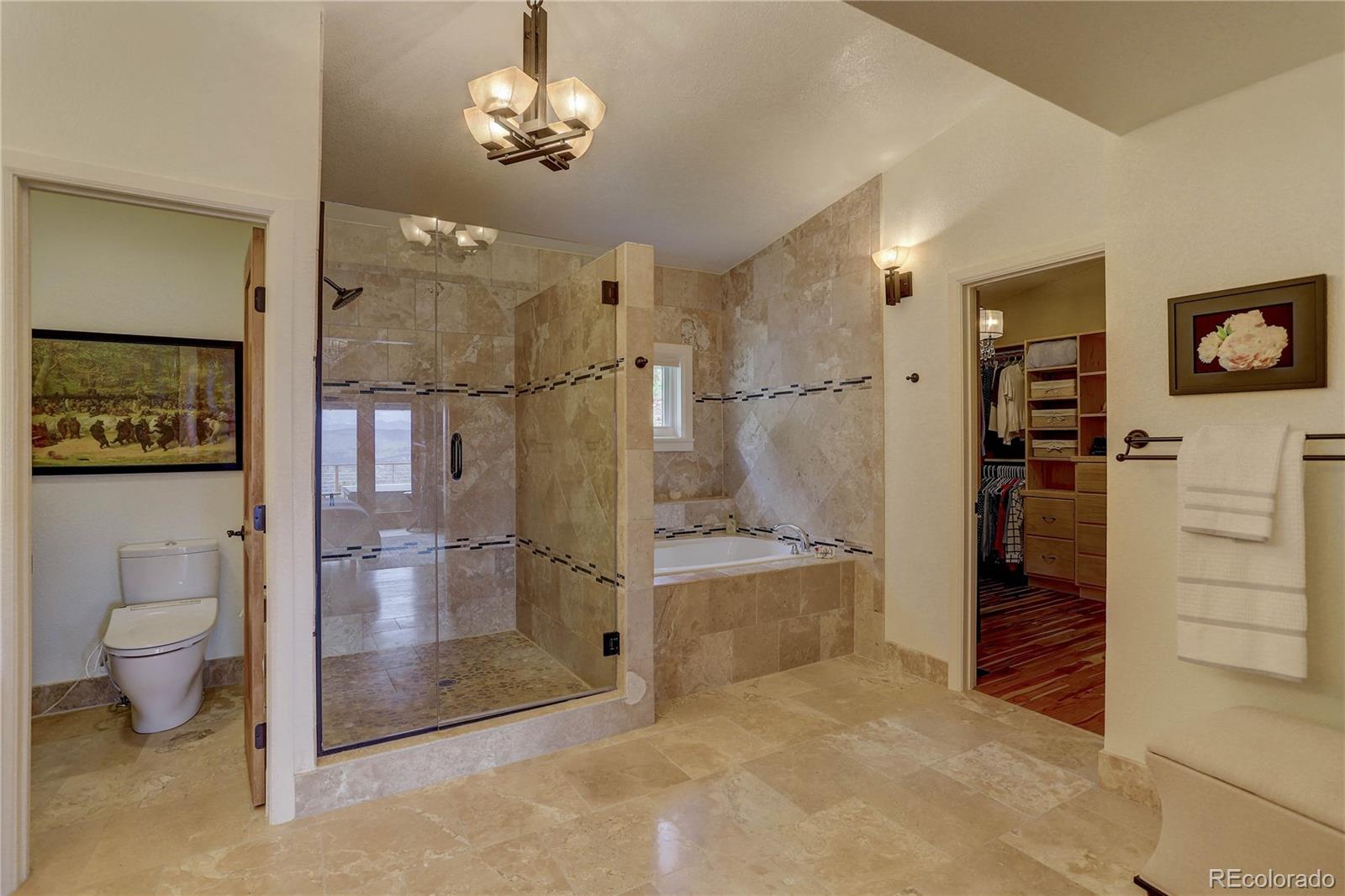 5886 Flagstaff Road Boulder, CO 80302 - Photo 22 of 37 a view of a hallway with bathroom and a view of bathroom