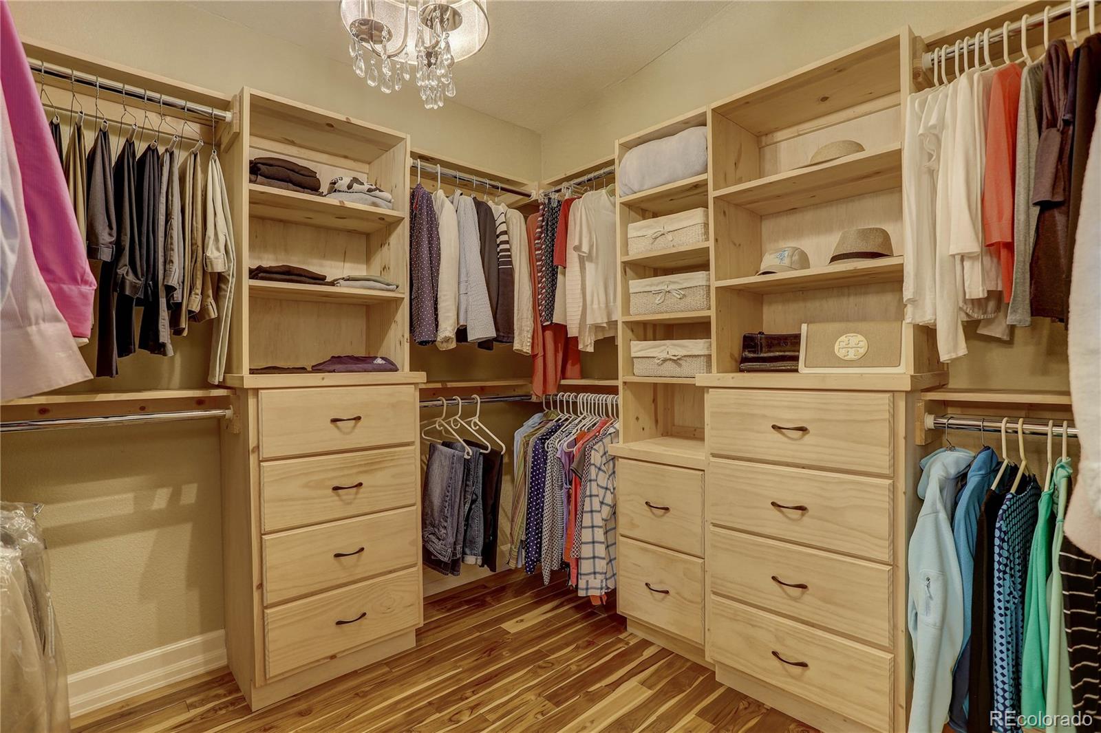 5886 Flagstaff Road Boulder, CO 80302 - Photo 23 of 37 a view of walk in closet with clothes and shoes