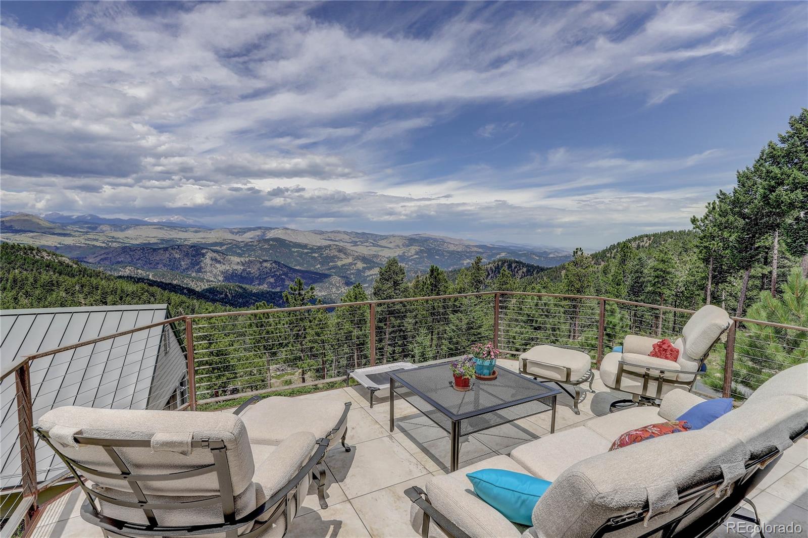 5886 Flagstaff Road Boulder, CO 80302 - Photo 31 of 37 a view of a chairs and table in patio