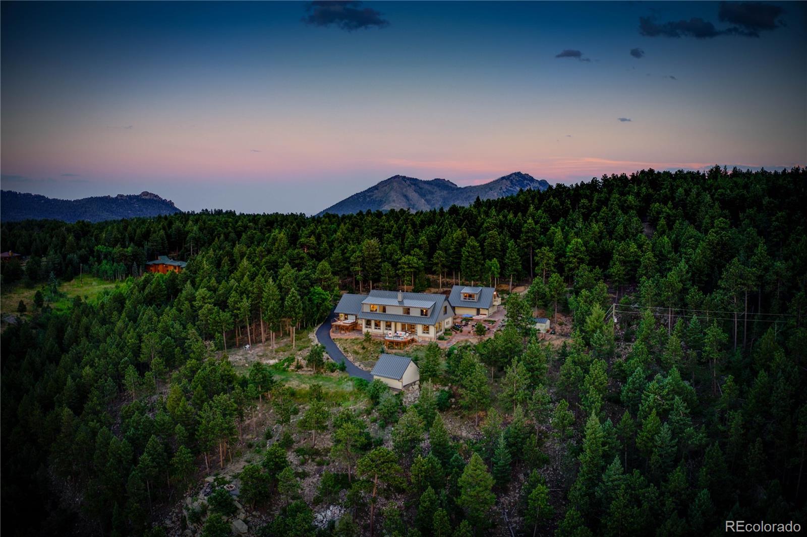 5886 Flagstaff Road Boulder, CO 80302 - Photo 35 of 37 a view of a city with lush green forest