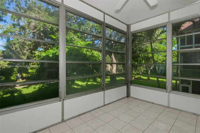 a view of a room and window