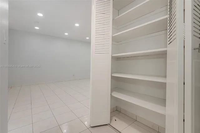a view of an empty walk in closet
