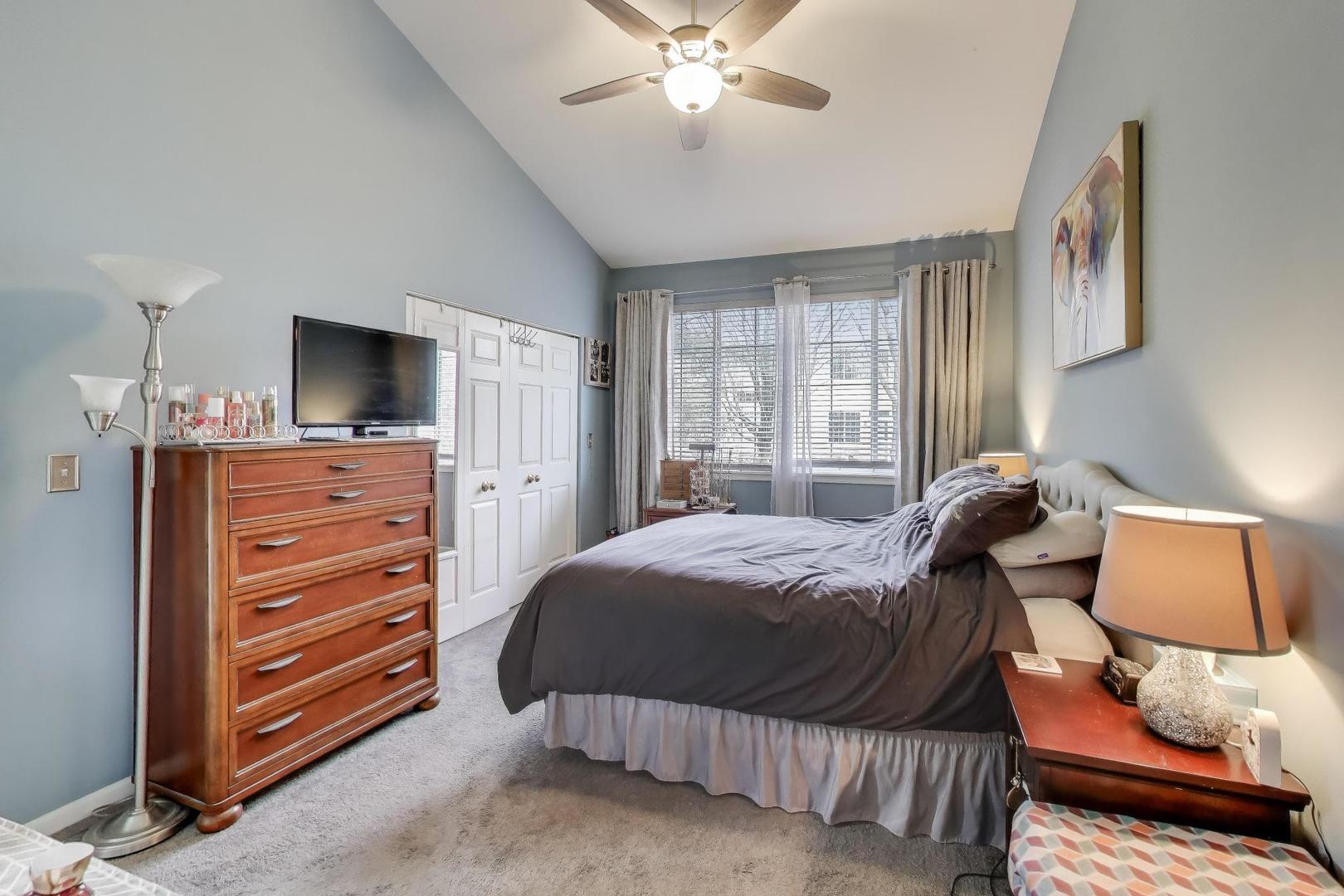 2487 Stonegate Road Algonquin, IL 60102 - Photo 13 of 39 a bedroom with a bed and furniture