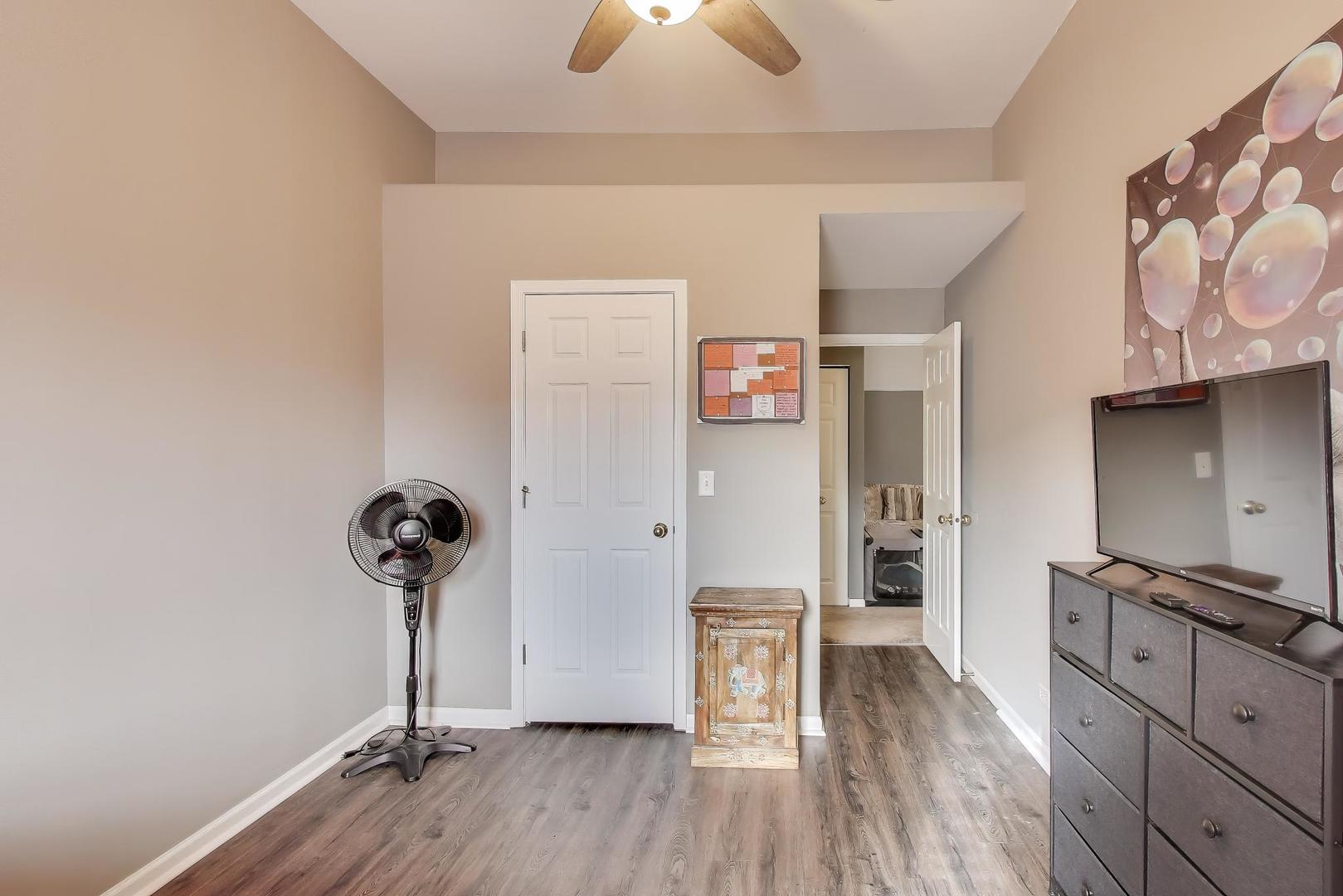 2487 Stonegate Road Algonquin, IL 60102 - Photo 24 of 39 wooden floor in an empty room