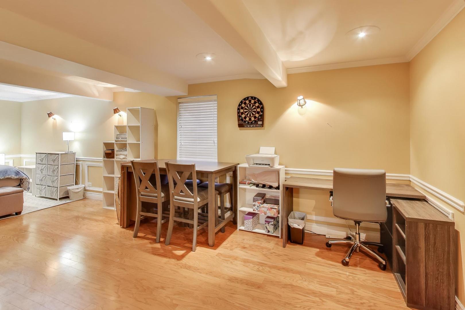 2487 Stonegate Road Algonquin, IL 60102 - Photo 27 of 39 a room with lots of chairs and a view of living room