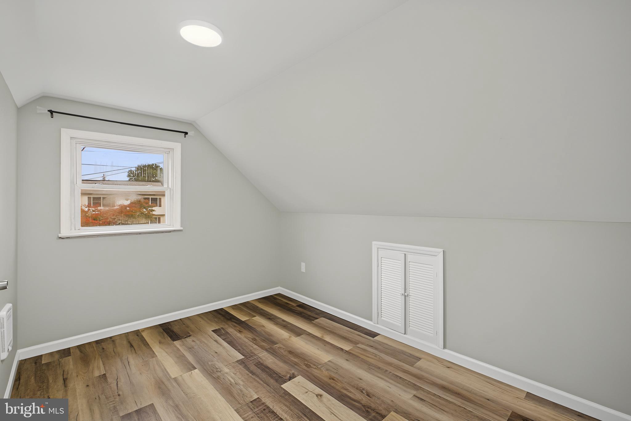 113 Rutledge Avenue Ewing, NJ 08618 - Photo 23 of 27 a view of empty room with wooden floor