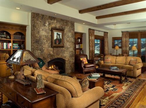 2845 Daybreak Ridge Road Avon, CO 81620 - Photo 5 of 6 a living room with furniture and a fireplace