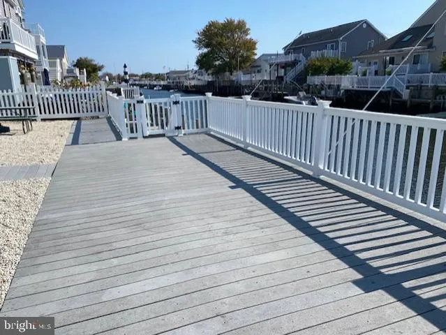 a view of balcony with deck and city view