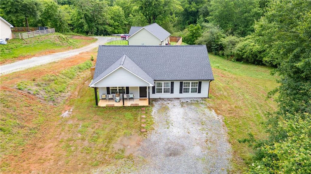 118 Wash Rider Road Dahlonega, GA 30533 - Photo 27 of 37 a aerial view of a house with swimming pool next to a yard