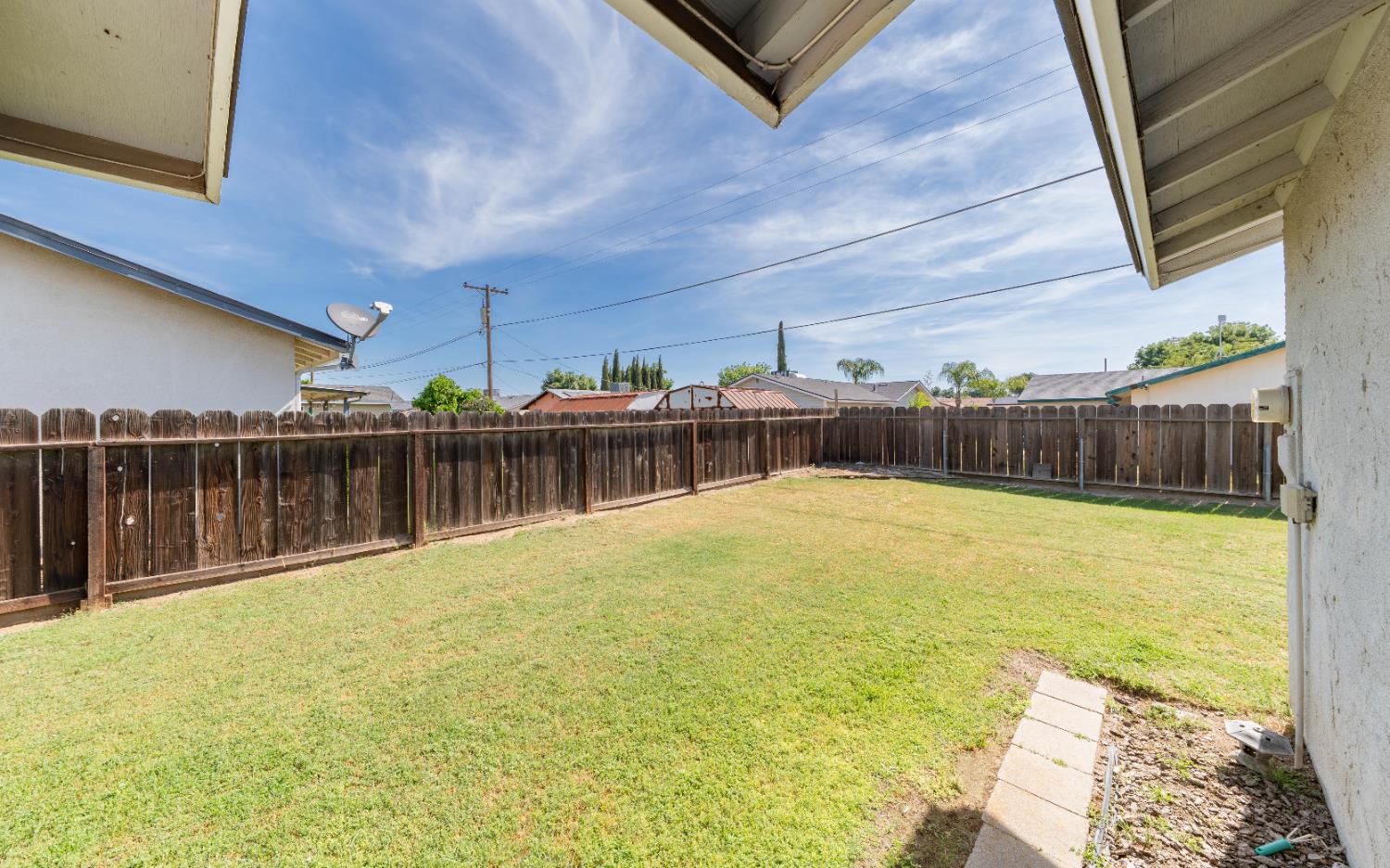 876 Daphne Lane Lemoore, CA 93245 - Photo 18 of 19 a view of a backyard