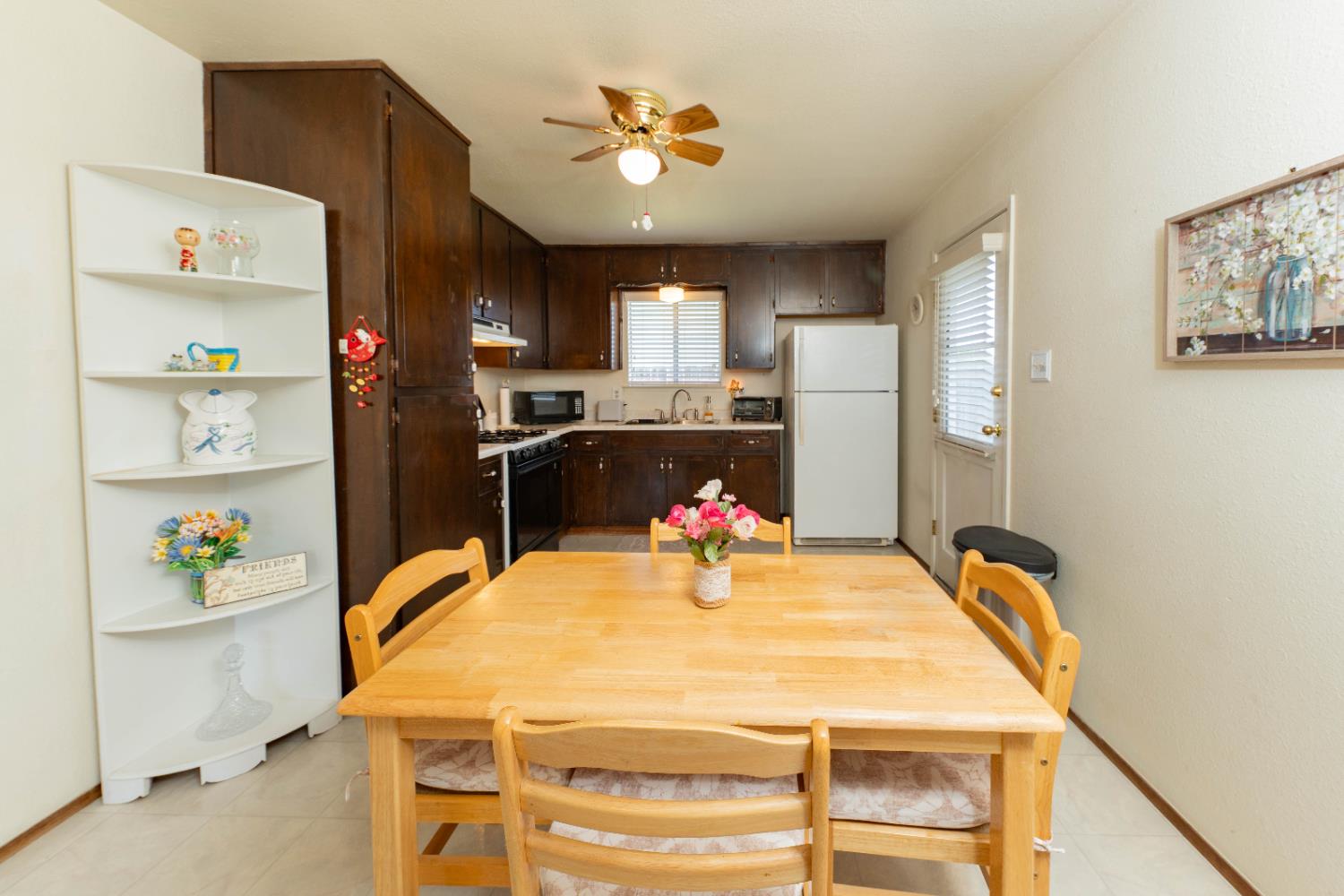 876 Daphne Lane Lemoore, CA 93245 - Photo 6 of 19 a very nice looking dining room with a table and chairs