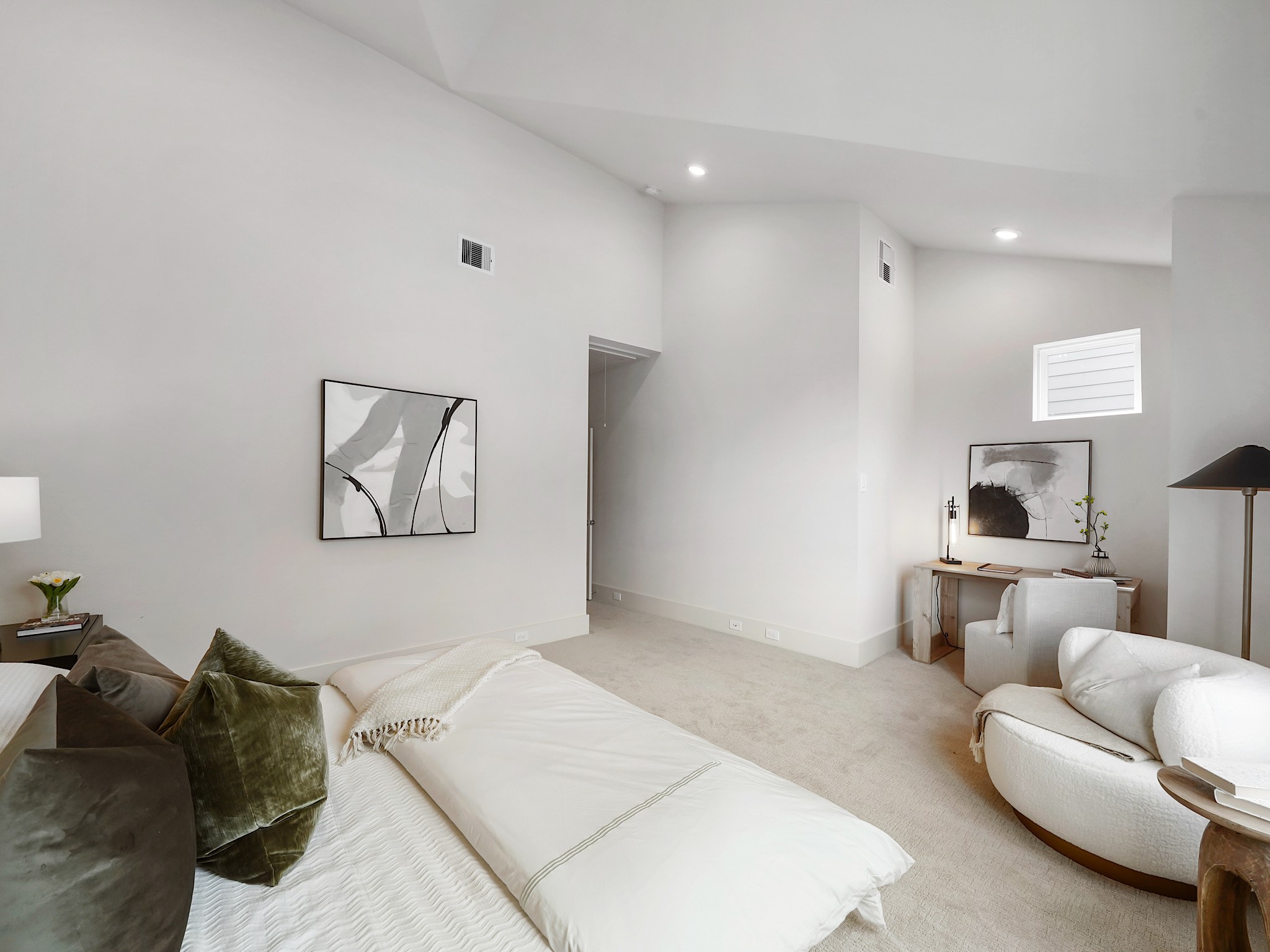 861 Rachel Street, Unit E Houston, TX 77091 - Photo 12 of 29 This spacious primary room offers a serene retreat with ample space for relaxation and personalized touches.