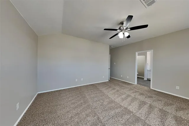 a view of a big room with carpet