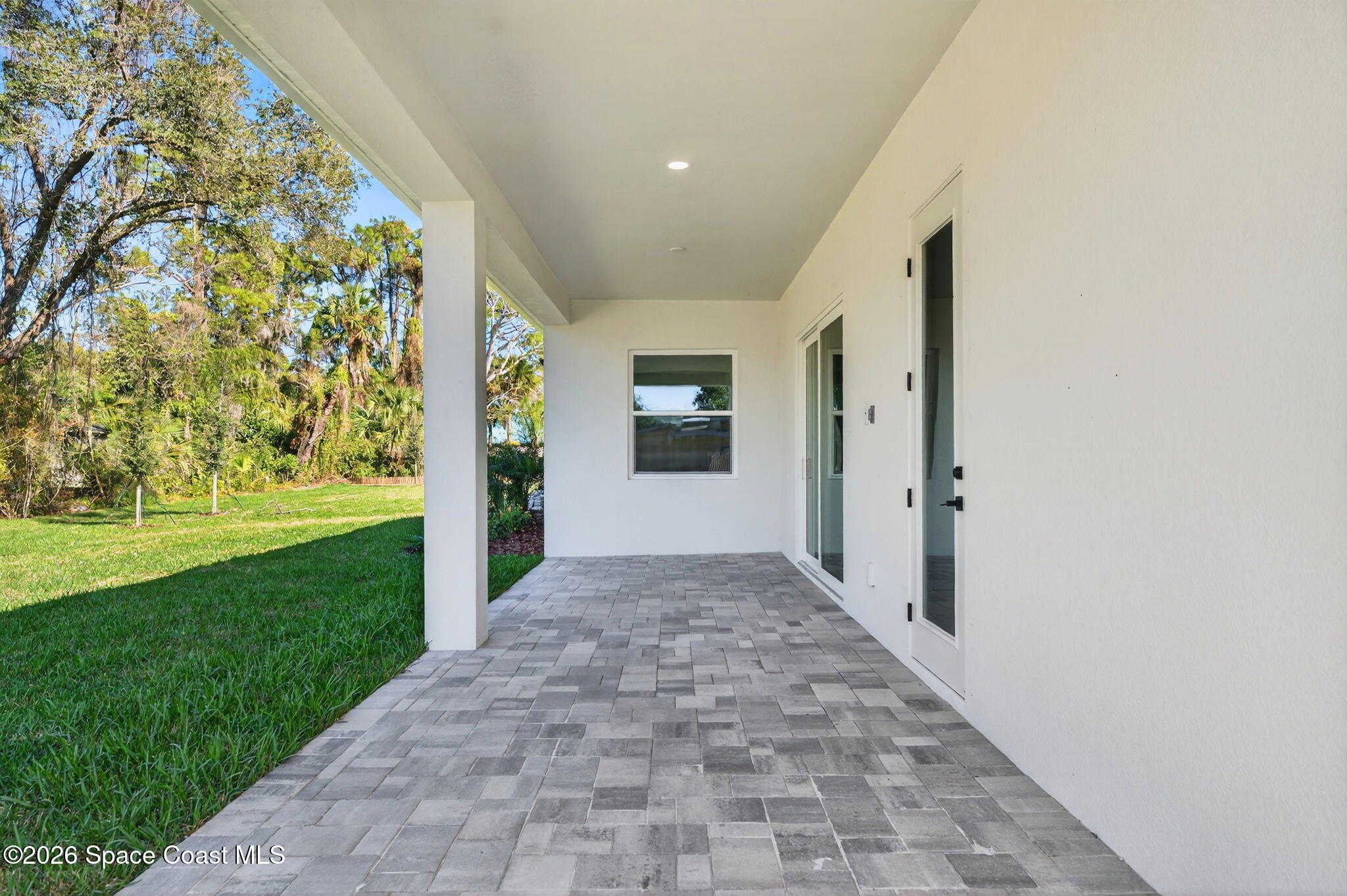 7482 Sheridan Road West Melbourne, FL 32904 - Photo 27 of 32 Large Trussed Porch