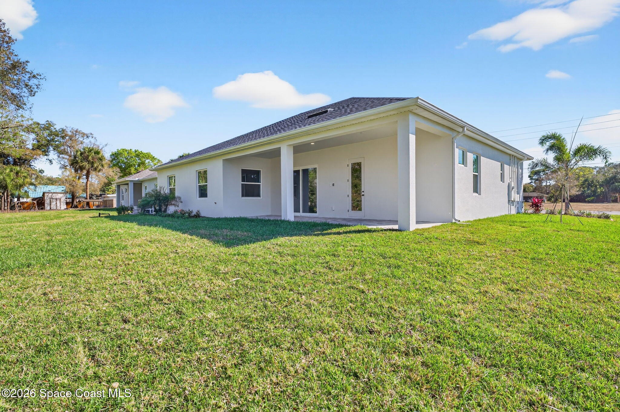 7482 Sheridan Road West Melbourne, FL 32904 - Photo 28 of 32 Large Trussed Porch