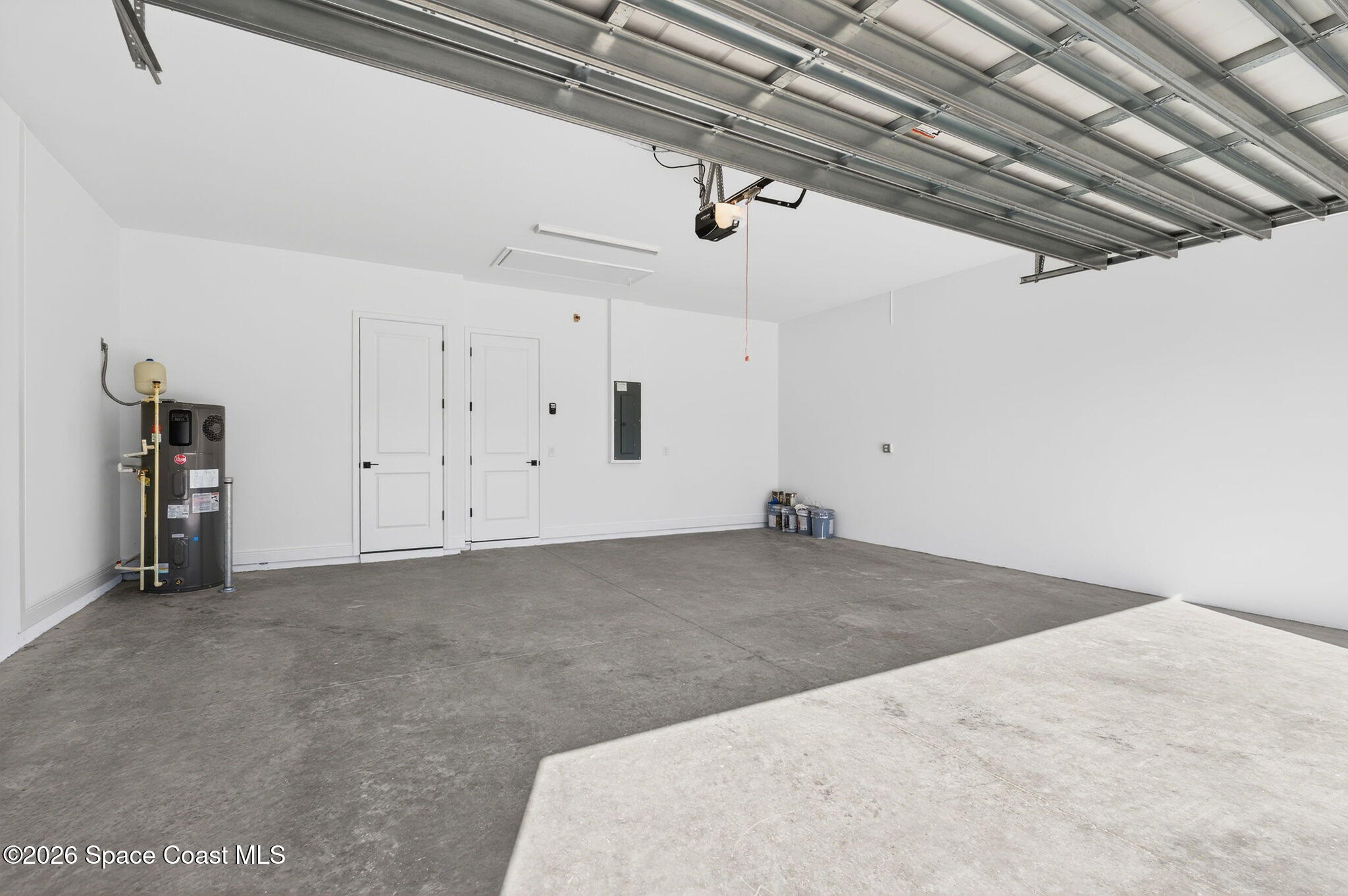 7482 Sheridan Road West Melbourne, FL 32904 - Photo 30 of 32 Oversized Garage w/Opener