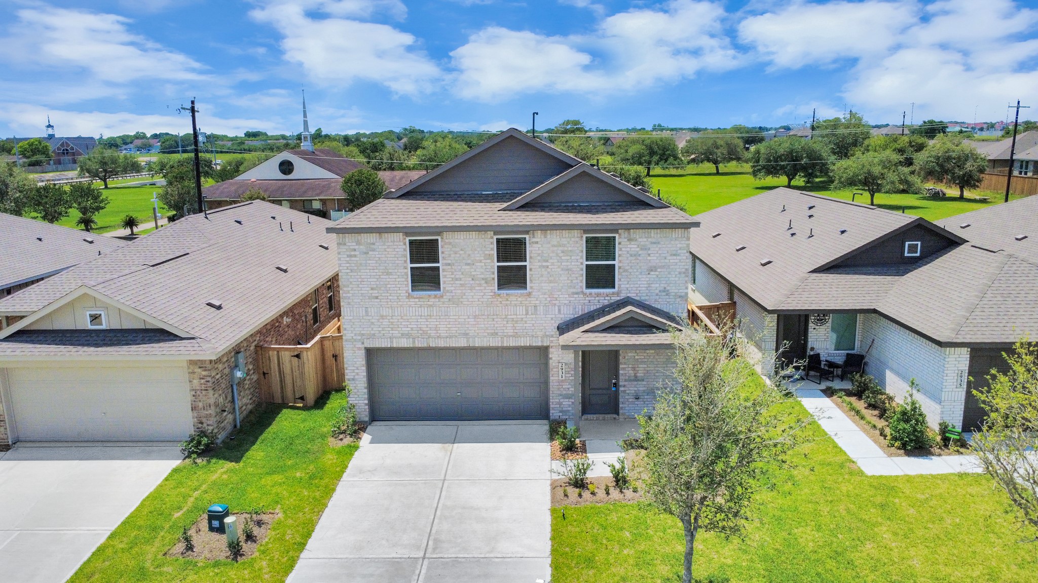 2931 Summer Breeze Way Angleton, TX 77515 - Photo 2 of 30 an aerial view of a house with a yard