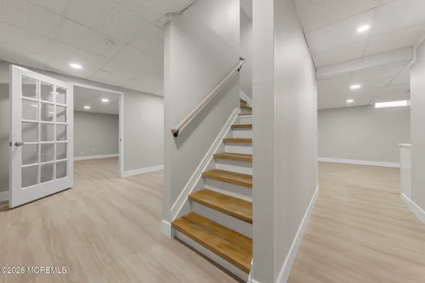 an entryway in a hall with a window
