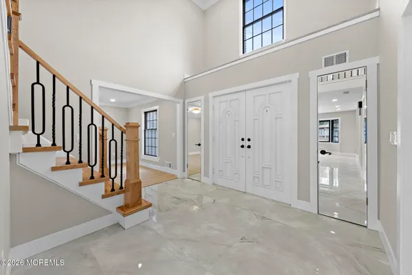 a view of an entryway with staircase