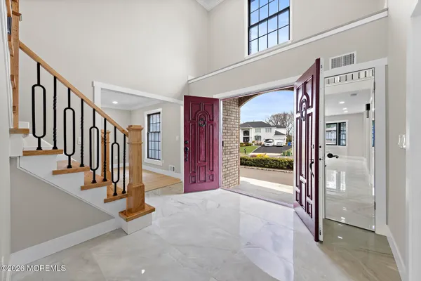 a view of a hallway with entryway