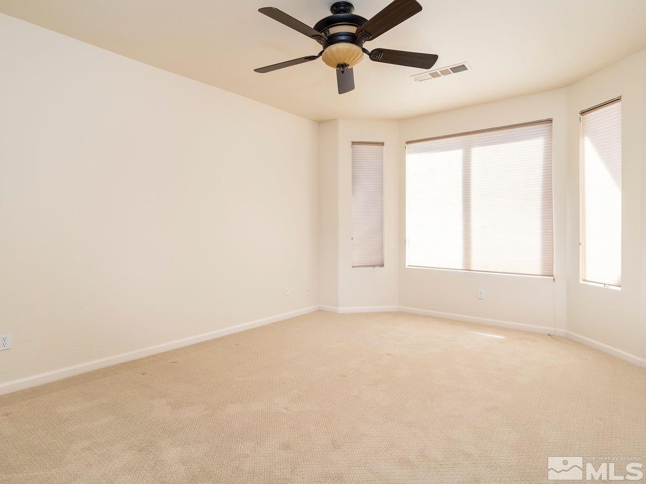 9132 Quilberry Way Reno, NV 89523 - Photo 8 of 26 a view of an empty room with a window