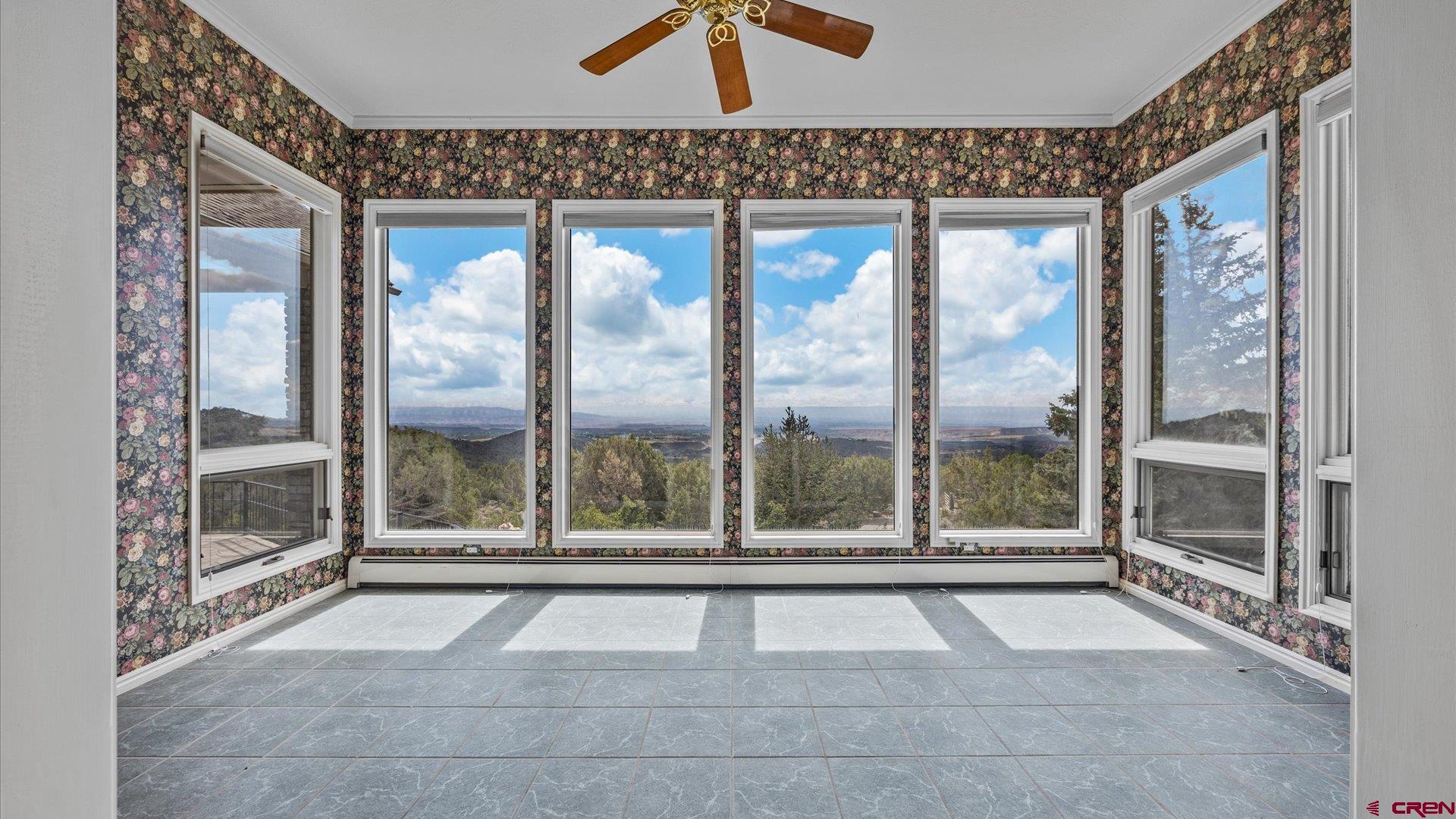 20508 Green Valley Road Cedaredge, CO 81413 - Photo 23 of 42 a view of an empty room with a balcony