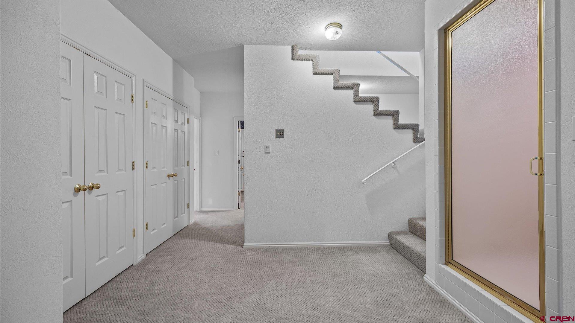 20508 Green Valley Road Cedaredge, CO 81413 - Photo 27 of 42 a view of a hallway with an empty room