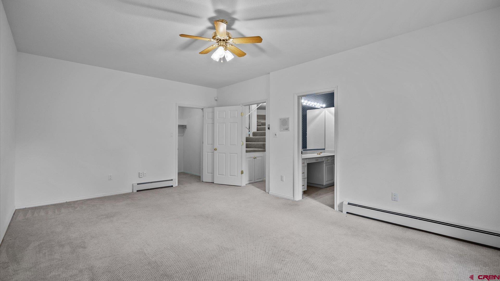 20508 Green Valley Road Cedaredge, CO 81413 - Photo 32 of 42 an empty room with a bathroom