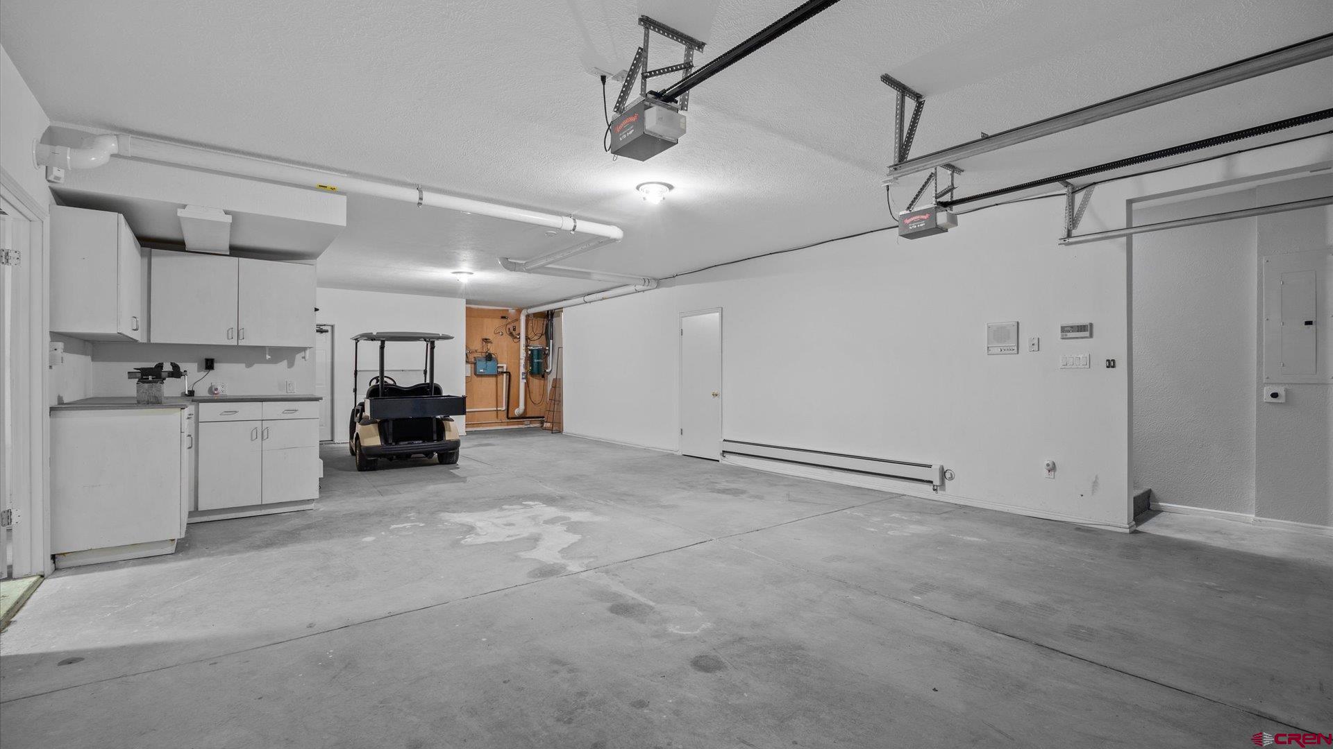20508 Green Valley Road Cedaredge, CO 81413 - Photo 34 of 42 a view of a kitchen with cabinet and a stove top oven
