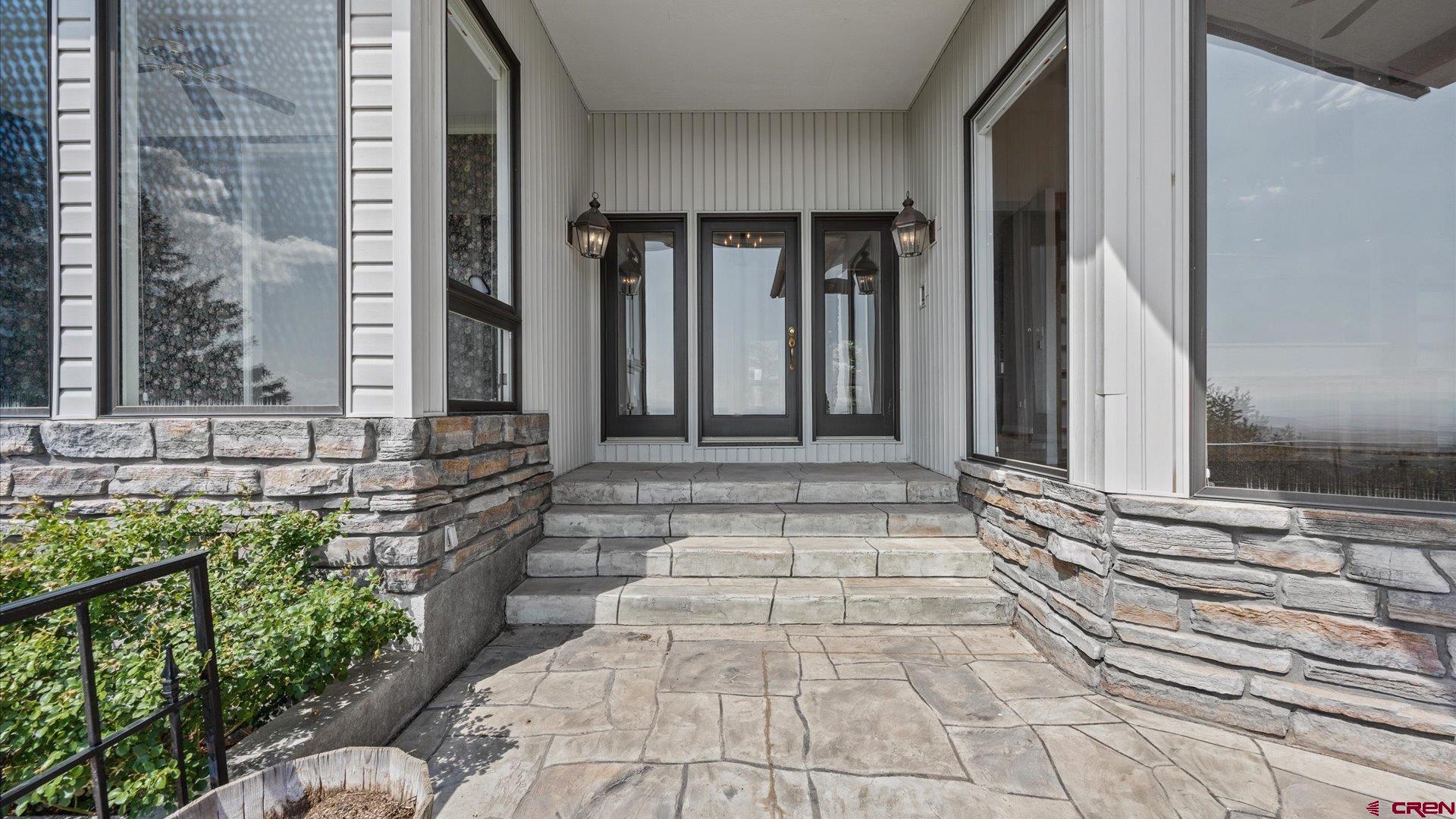 20508 Green Valley Road Cedaredge, CO 81413 - Photo 9 of 42 a front view of a house with shower