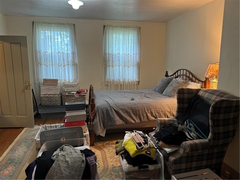 149 South Franklin Street Prospect, PA 16052 - Photo 12 of 25 a bedroom with a bed and a couch