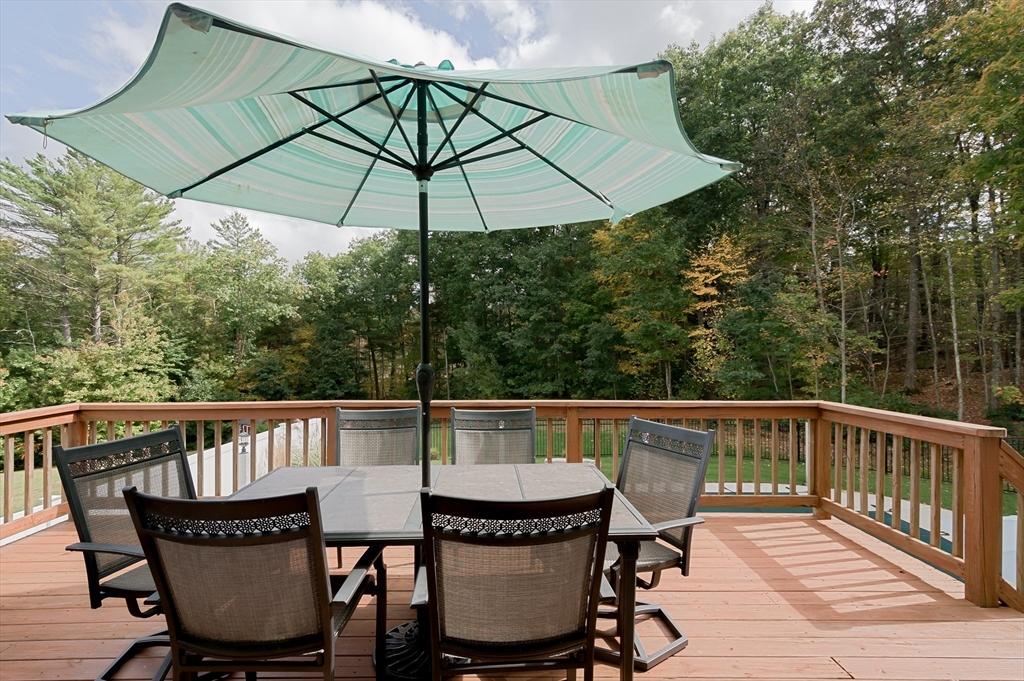 6 Carlson's Way Rutland, MA 01543 - Photo 26 of 34 a view of a chair and table on the deck
